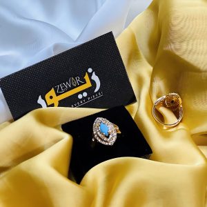Elegant Gold Ring with Light Blue Stone